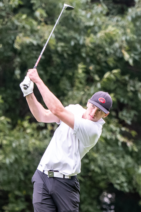 DIANNA OATRIDGE | THE VINDICATOR  Girard's Dominic Molito tees off on Hole No. 4 during play at the Division II District Tournament at Windmill Lakes Golf Course in Ravenna on Tuesday.
