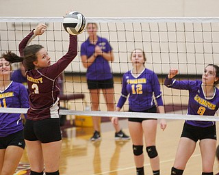 Liberty's Allyson Jones watches as the ball gets past her after Champion's Maggie Dunlap (8) hits it over the net during their game at Liberty on Wednesday. EMILY MATTHEWS | THE VINDICATOR