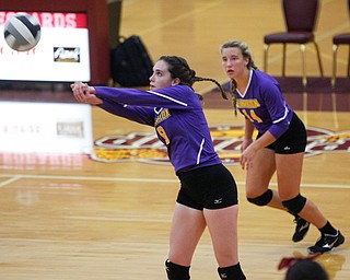 Champion's Maggie Dunlap passes the ball during their game against Liberty at Liberty on Wednesday. EMILY MATTHEWS | THE VINDICATOR