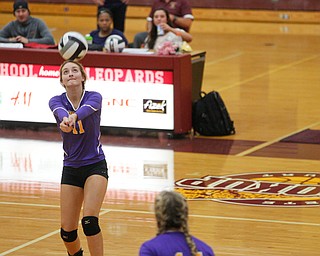 Champion's Grace Mahan passes the ball during their game against Liberty at Liberty on Wednesday. EMILY MATTHEWS | THE VINDICATOR