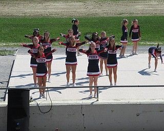 Neighbors | Jessica Harker .The Austintown cheerleaders performed their competition routine during the Canfield Fair on Aug. 29.