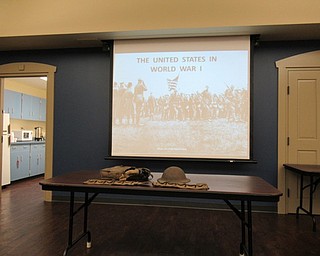 Neighbors | Jessica Harker .Presenter Lieutenant Colonel Rick Hossler brought army gear to accompany his prenetation to the Friends of the Boardman library group on Sept. 10.