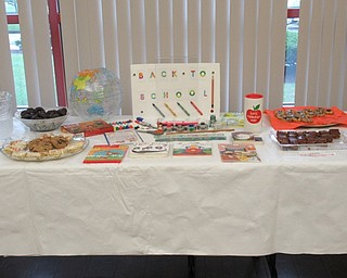 Neighbors | Jessica Harker.Snacks provided by members of the Friends of the Boardman Library group were available to those present during the meeting, with a back to school theme.