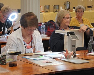 Neighbors | Jessica Harker.Participants attended the counted canvas workshop held by the Embroiderers' Guild of Youngstown for Ohio State Day Sept. 14 through 15.