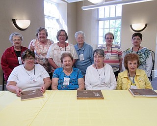 Neighbors | Jessica Harker.Members of the Youngstown Embroiderers' Guild posed Sept 14 at the Poland library.