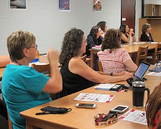 Neighbors | Jessica Harker.Teachers gathered at the library in Boardman high school for Stop the Bleed training Sept. 19.