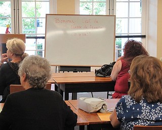Neighbors | Jessica Harker.Community members participated in the first Conversational French class in a six week series at the Poland library Sept. 19.