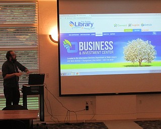 Neighbors | Jessica Harker.Edward Koltonski, a business librarian, hosted the Your Business: From Idea to Action event at the Austintown library where he showed community members resources the library has to offer local businesses.