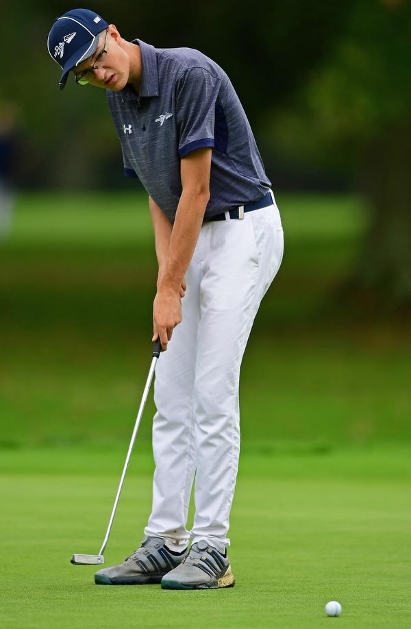 ALLIANCE, OHIO - OCTOBER 4, 2018: Justin Atkinson of Brookfield watches his putt on the 11th hole during the Division 3 district tournament at Tannenhauf Golf Club, Thursday afternoon. DAVID DERMER | THE VINDICATOR