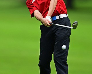 ALLIANCE, OHIO - OCTOBER 4, 2018: Seth Ross of Columbiana watches his approach shot on the 17th hole during the Division 3 district tournament at Tannenhauf Golf Club, Thursday afternoon. DAVID DERMER | THE VINDICATOR