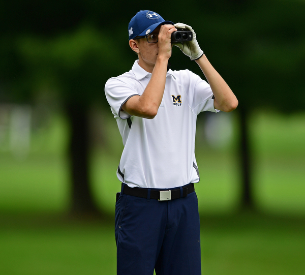 ALLIANCE, OHIO - OCTOBER 4, 2018: Zavier Bokan of McDonald uses a range finder on the 17th hole during the Division 3 district tournament at Tannenhauf Golf Club, Thursday afternoon. DAVID DERMER | THE VINDICATOR
