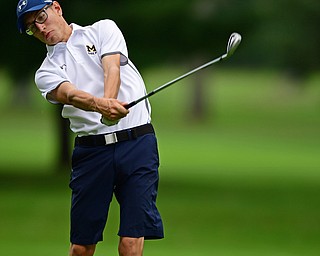 ALLIANCE, OHIO - OCTOBER 4, 2018: Zavier Bokan of McDonald watches his approach shot on the 17th hole during the Division 3 district tournament at Tannenhauf Golf Club, Thursday afternoon. DAVID DERMER | THE VINDICATOR