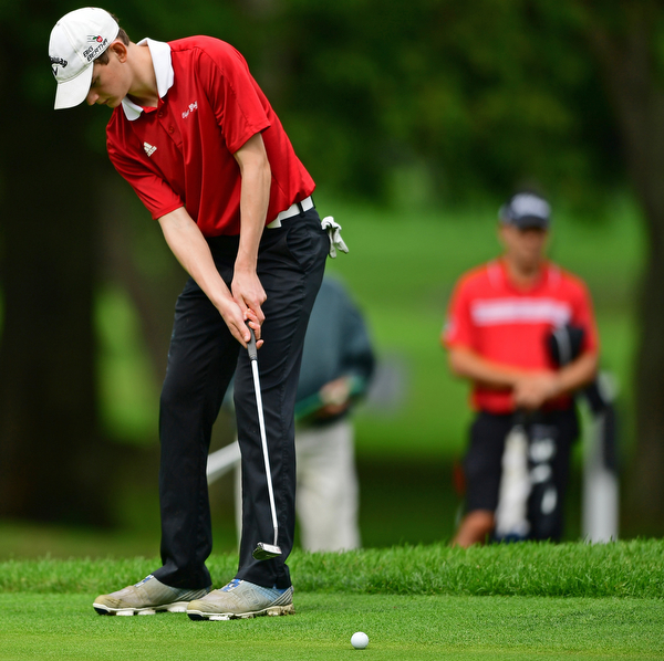ALLIANCE, OHIO - OCTOBER 4, 2018: Seth Ross of Columbiana watches his putt on the 17th hole during the Division 3 district tournament at Tannenhauf Golf Club, Thursday afternoon. DAVID DERMER | THE VINDICATOR
