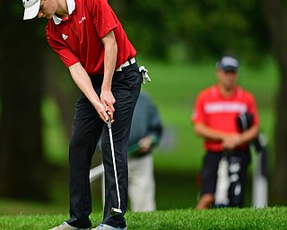 ALLIANCE, OHIO - OCTOBER 4, 2018: Seth Ross of Columbiana watches his putt on the 17th hole during the Division 3 district tournament at Tannenhauf Golf Club, Thursday afternoon. DAVID DERMER | THE VINDICATOR