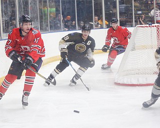 Youngstown's John Larkin tries to get the puck past Muskegon during their game at Covelli Centre on Friday night. EMILY MATTHEWS | THE VINDICATOR