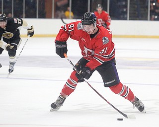 Youngstown's Connor MacEachern gets ready to shoot the puck toward the goal during their game at Covelli Centre on Friday night. EMILY MATTHEWS | THE VINDICATOR