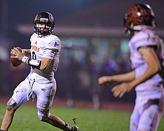 BERLIN CENTER, OHIO - OCTOBER 5, 2018: Springfield's Brannon Brungard looks downfield to pass during the second half of their game, Friday night at Western Reserve High School. DAVID DERMER | THE VINDICATOR