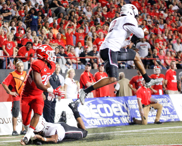 Southern Illinois's Jeremy Chinn intercepts the ball from YSU during the first half of their game at Stambaugh Stadium on Saturday. EMILY MATTHEWS | THE VINDICATOR
