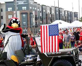 Pete the Penguin participates in the YSU homecoming parade on Saturday. EMILY MATTHEWS | THE VINDICATOR