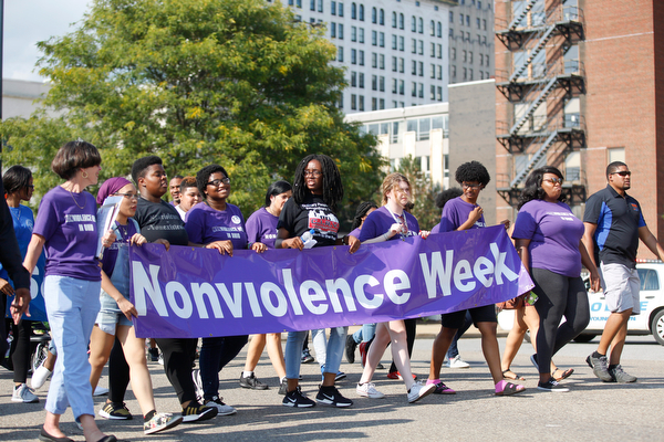 Participants in the Nonviolence Week parade march down Front Street on Sunday afternoon. The parade was the kickoff for Nonviolence week in Youngstown. EMILY MATTHEWS | THE VINDICATOR