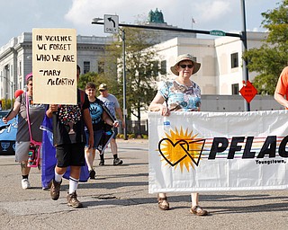 Members of the organization PFLAG march in the Nonviolence Week parade on Sunday afternoon. The parade was the kickoff for Nonviolence week in Youngstown. EMILY MATTHEWS | THE VINDICATOR