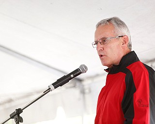 YSU President Jim Tressel speaks at the Nonviolence Week Rally outside of Covelli Centre on Sunday afternoon. EMILY MATTHEWS | THE VINDICATOR