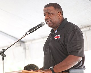 Youngstown Mayor Tito Brown speaks at the Nonviolence Week Rally outside of Covelli Centre on Sunday afternoon. EMILY MATTHEWS | THE VINDICATOR