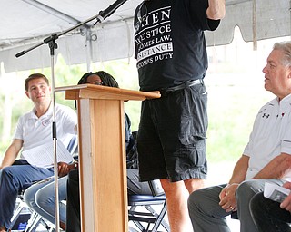 Jeff Steinberg, the Founder and Executive Director of Sojourn to the Past, speaks at the Nonviolence Week Rally outside of Covelli Centre on Sunday afternoon. EMILY MATTHEWS | THE VINDICATOR