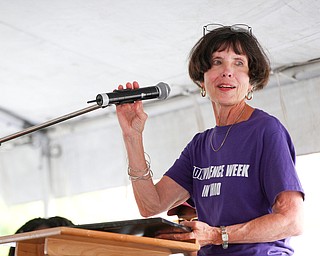 Penny Wells, the director of the Mahoning Valley chapter of Sojourn to the Past, speaks at the Nonviolence Week Rally outside of Covelli Centre on Sunday afternoon. EMILY MATTHEWS | THE VINDICATOR