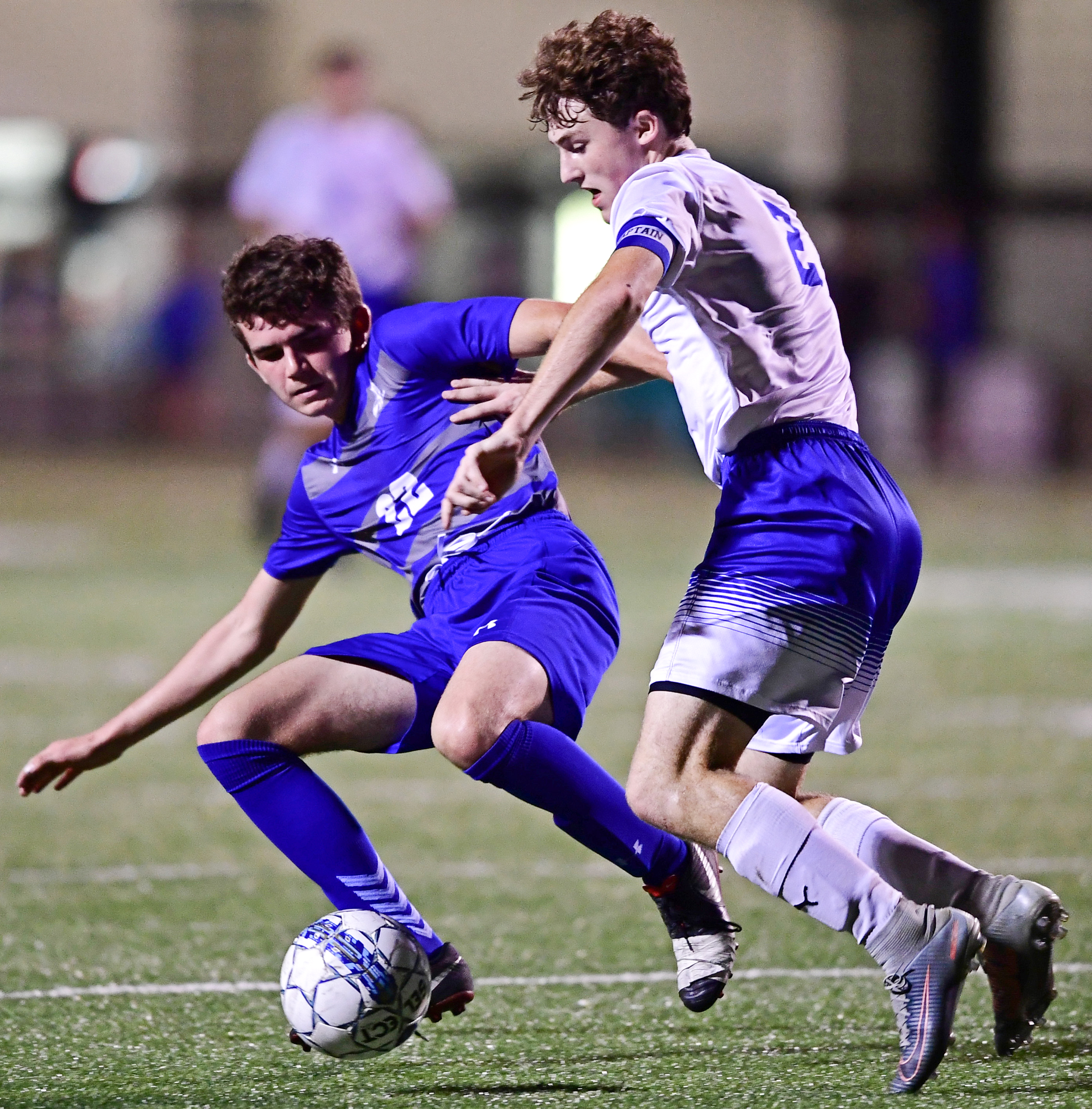 Brennen Testa, left of Poland Seminary High School, blocks Jacob Gulu of Hubbard High School of the way to play the ball during the first half of their soccer match. Hubbard beat Poland 5-1 Tuesday.