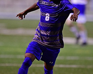 HUBBARD, OHIO - OCTOBER 9, 2018: Poland's Derrick Cobbin dribbles the ball upfield during the second half of their game, Tuesday night at Hubbard Eagles Stadium. DAVID DERMER | THE VINDICATOR