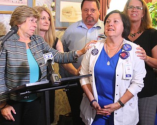 William D. Lewis The Vindicator  Randi Weingarten, AFT president,left stands with  Jennie Mulichak, 1rst VP of Youngstown General Duty Nurses assoc union  during a 9-6-18 news conference on negotiations for Northside nurses..