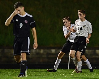 CAMPBELL, OHIO - OCTOBER 9, 2018: Crestview's Colt Crane (14) is congratulated by Ryan Emch after scoring a goal during the first half of their game, Wednesday night at Campbell High School. Campbell's Petros Atsas reacts. DAVID DERMER | THE VINDICATOR