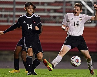 CAMPBELL, OHIO - OCTOBER 9, 2018: Crestview's Colt Crane blocks the pass intended for Campbell's Ariel Dimas during the first half of their game, Wednesday night at Campbell High School. DAVID DERMER | THE VINDICATOR