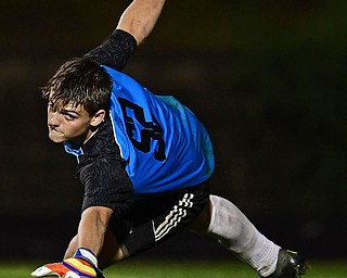 CAMPBELL, OHIO - OCTOBER 9, 2018: Crestview goalie Carter Blakeman dives in an unsuccessful attempt to prevent a goal scored by Campbell's Henry Perdomo Mejia  during the first half of their game, Wednesday night at Campbell High School. DAVID DERMER | THE VINDICATOR