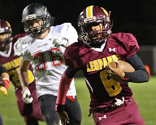 illiam D. Lewis The Vindicator  Liberty's Migel Burgess(6) eludes a Jefferson defender during 10-11-18 action at Liberty.