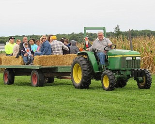 Neighbors | Jessica Harker.The MetroParks Farms had free tractor rides Sept. 22 for the annual Sunset at the Farms event.