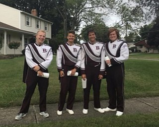 Neighbors | Submitted .James Valentin, Bryce Winebold, Mikey Kanos and Dylan Shook, members of the Boardman band, collected money for the band on Tag Day Sept. 22.