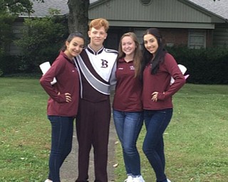 Neighbors | Submitted .Desi Girardi, Max Rassega, Maddie Murray and Dani Girardi, members of the Boardman band, went door to door to collect money to support the band on Tag Day Sept. 22.