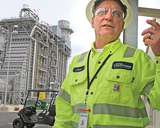 Plant manager Drew Schneider stands outside the newly operational $900 million Lordstown Energy Center.