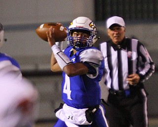 William D. Lewis The Vindicator   Hubbard's Davion Daniels looks downfield during 10-12-18 game with Struthers