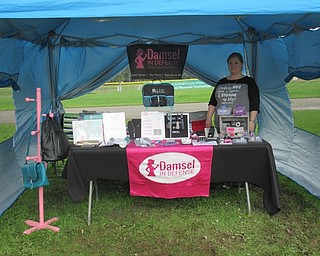 Neighbors | Jessica Harker.Jennifer Arden sold Damsel in Defense protective equiptment for women at the Woodside Community Garden Oktoberfest at the Austintown Park on Oct. 6.
