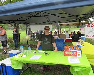 Neighbors | Jessica Harker.Andrea Bowden, a Woodside Community Garden board member, volunteered at their Oktoberfest event on Oct. 6.