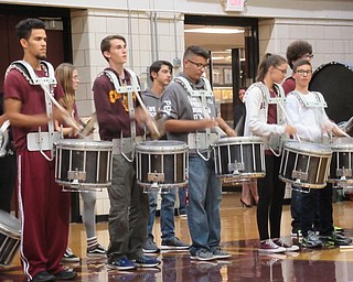 Neighbors | Jessica Harker.The Boardman marching band drum line played for students and staff alike as part of the homecoming pep rally before the football game held Oct. 5.