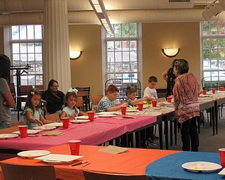 Neighbors | Jessica Harker.Childrens librarian Amanda Kollar ran the Poland libraries Halloween Paint Party on Oct. 2.