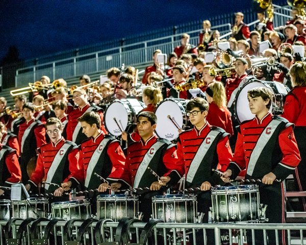 DIANNA OATRIDGE | THE VINDICATOR The Canfield Cardinal Band plays stand music during the Youngstown East versus Canfield football game at Rayen Stadium in Youngstown on Friday.