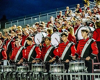 DIANNA OATRIDGE | THE VINDICATOR The Canfield Cardinal Band plays stand music during the Youngstown East versus Canfield football game at Rayen Stadium in Youngstown on Friday.