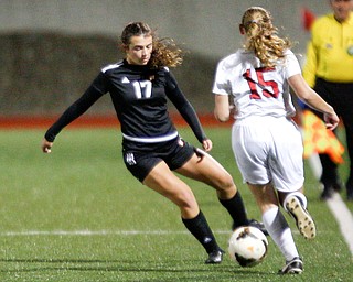 Mooney's Madison Richey steals the ball from Struthers' Cadence Carbon during their game at Farmers National Bank Soccer Field on Monday. EMILY MATTHEWS | THE VINDICATOR