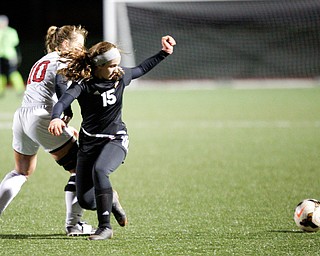 Mooney's Anna Wollet and Struthers' Sabrina Bartholomew go after the ball during their game at Farmers National Bank Soccer Field on Monday. EMILY MATTHEWS | THE VINDICATOR