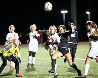 Struthers' Sabrina Bartholomew (10) kicks the ball up during their game against Mooney at Farmers National Bank Soccer Field on Monday. EMILY MATTHEWS | THE VINDICATOR